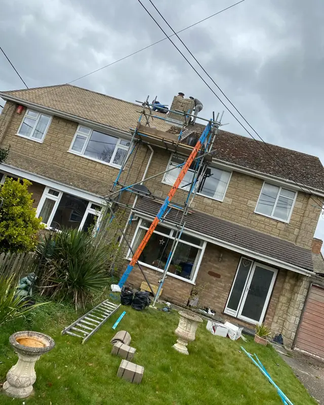 Scaffold tower up for roof work on a semi-detached house