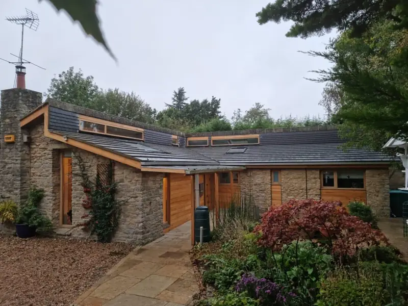New roof on a timber-clad bungalow