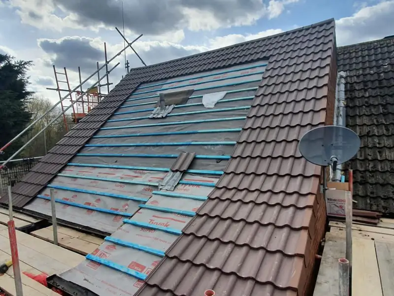 Re-roof in progress, new tiles going on
