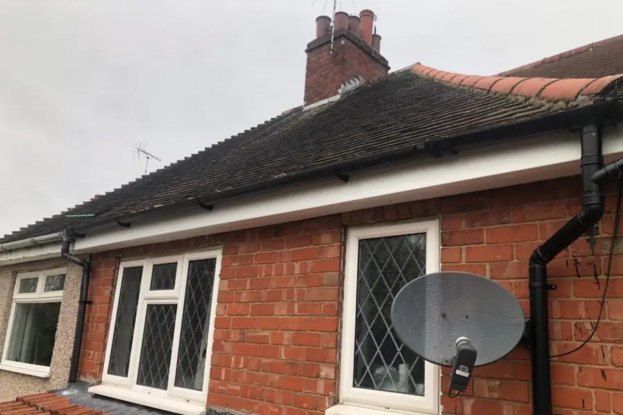 Bungalow roof with chimney, fascias and guttering